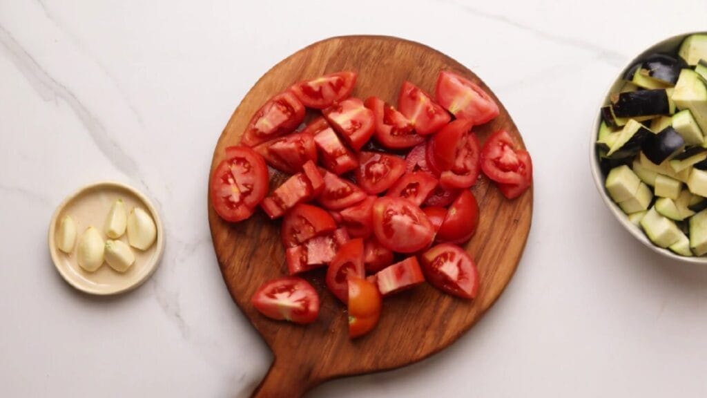 garlic cloves, chopped tomatoes and eggplants