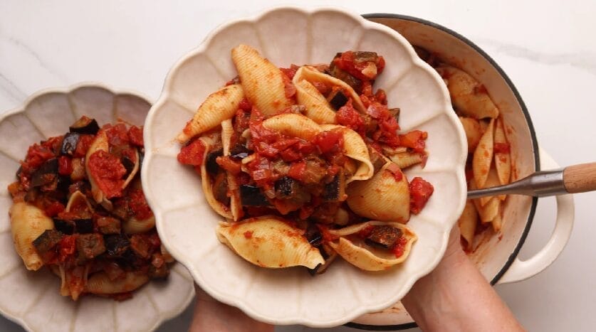 roasted-eggplant-and-tomato-pasta-in-a-pot-and-served-on-a-plate