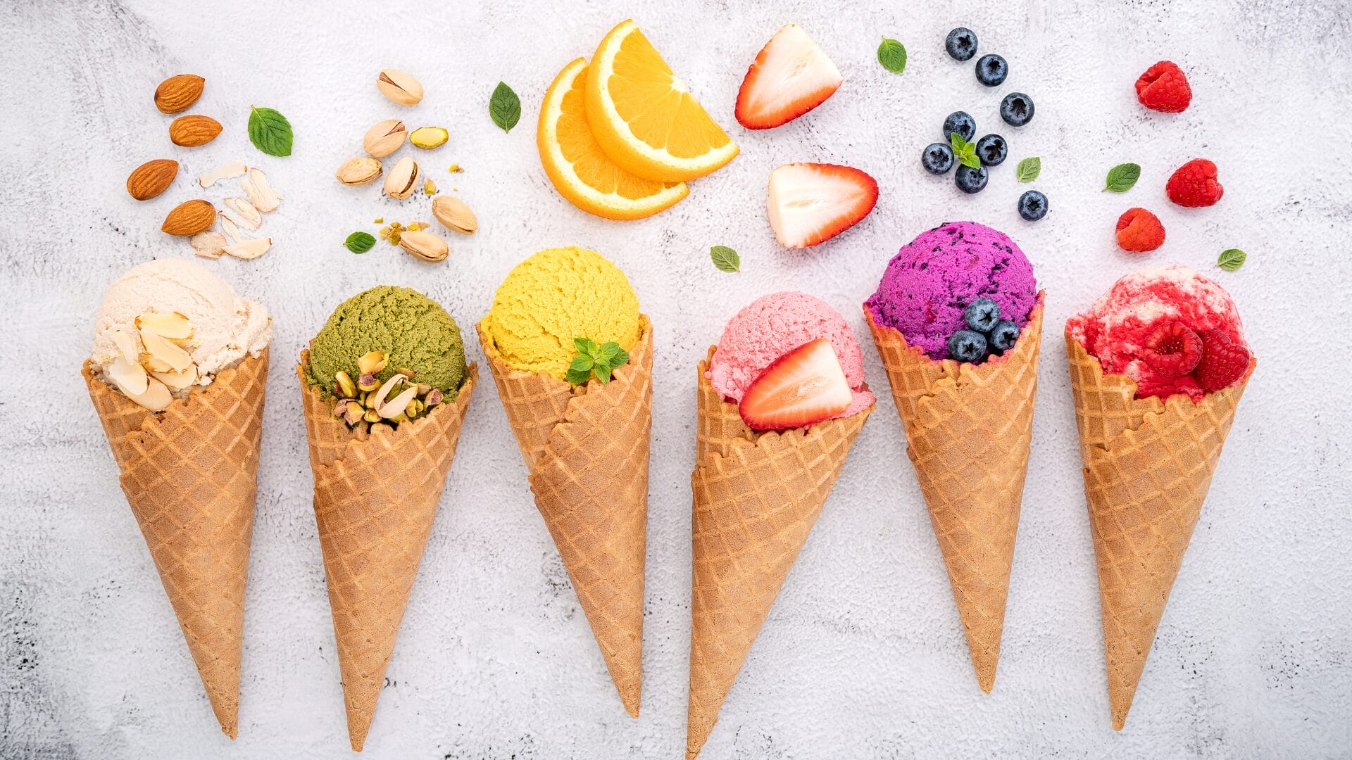 variety of ice creams in cones